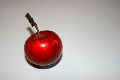 Close-up of apple against white background