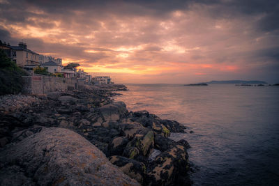 Scenic view of sea against sky during sunset