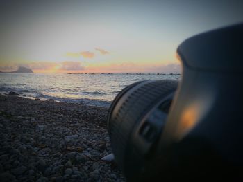 Close-up of sea during sunset