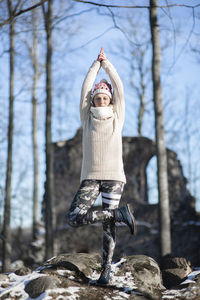 Yoga outdoor. happy woman doing yoga exercises. yoga meditation in nature. concept of health. 