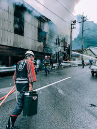 People walking on street in city