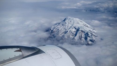 Scenic view of snow mountains against sky