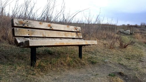 Old wooden fence on field