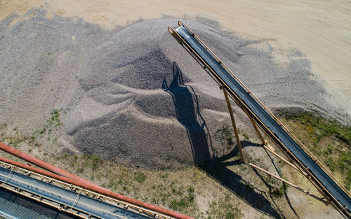 Gravel quarrying in a gravel pit during a drone flight