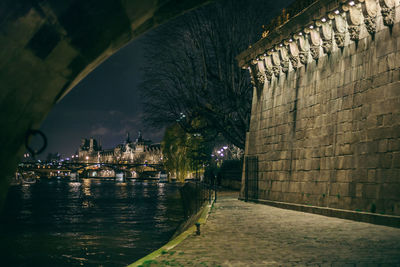 River passing through city at night