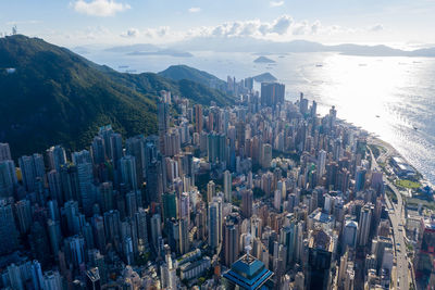 High angle view of city buildings against sky