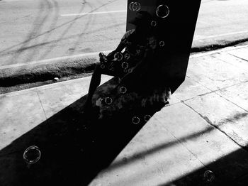 High angle view of man shadow on floor