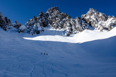 Scenic view of snow covered mountain against sky