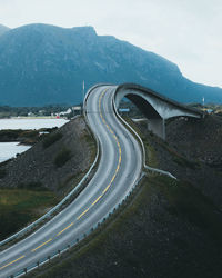 High angle view of vehicles on road against sky