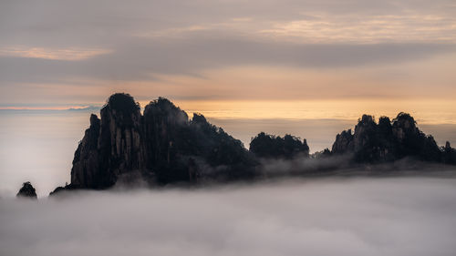 Panoramic view of sea against sky during sunset