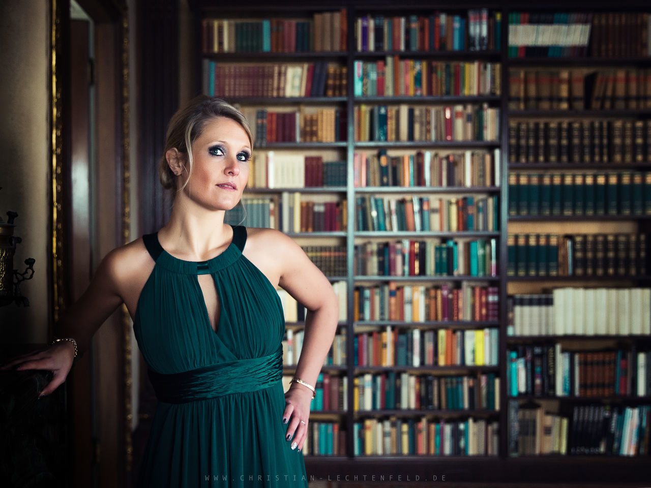 one person, young adult, standing, publication, book, looking at camera, front view, portrait, indoors, women, shelf, young women, beautiful woman, beauty, adult, focus on foreground, bookshelf, hairstyle