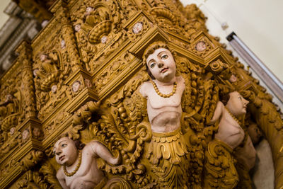 Low angle view of buddha statue