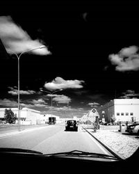View of road against cloudy sky