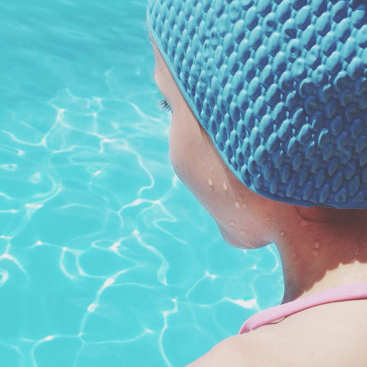 water, swimming pool, blue, low section, person, sea, turquoise colored, leisure activity, high angle view, lifestyles, part of, rippled, vacations, personal perspective, barefoot, sunlight, swimming