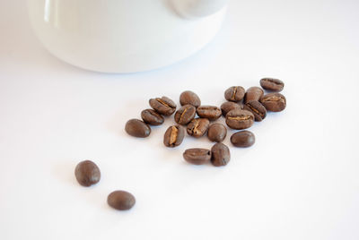 Close-up of coffee beans on table