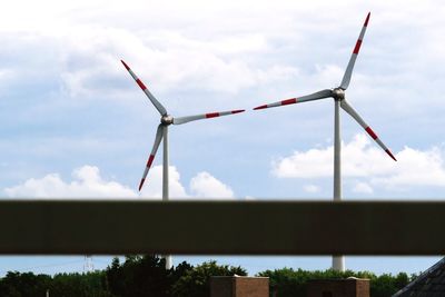 Traditional windmill against sky