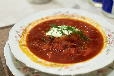 Close-up of served soup in plate