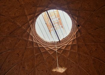 Low angle view of illuminated chandelier