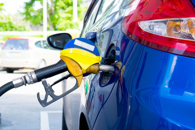 Close-up of car at fuel station