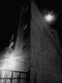 Low angle view of building against sky at night