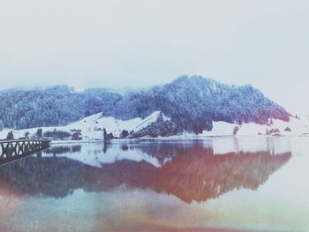 Scenic view of snow covered mountain against sky