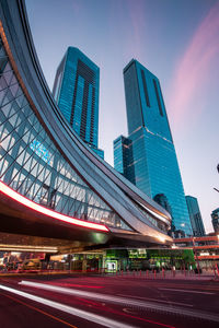 Low angle view of modern buildings against sky