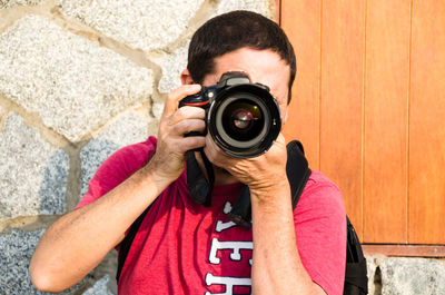 Portrait of man photographing