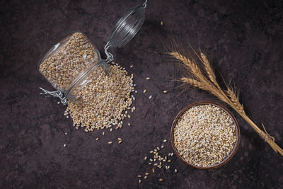 Organic uncooked dried barley cereal grain in a bowl