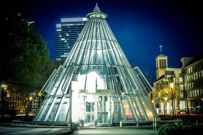 Low angle view of illuminated building at night