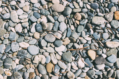 Full frame shot of pebbles at beach