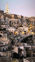 High angle view of buildings in city against clear sky