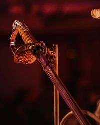 Close-up of illuminated lighting equipment at night