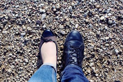 Low section of people on gravel