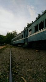 Railroad track against sky