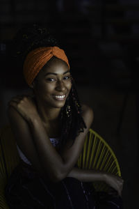 Interior portrait of young latin woman