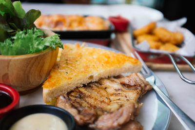 Close-up of breakfast served on table