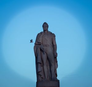 Low angle view of statue against clear sky