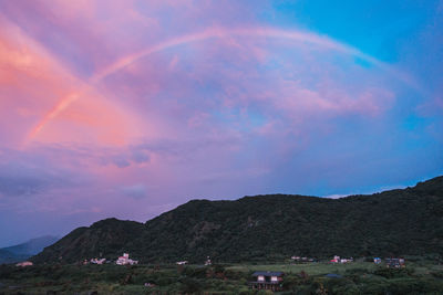 Scenic view of mountains against sky during sunset