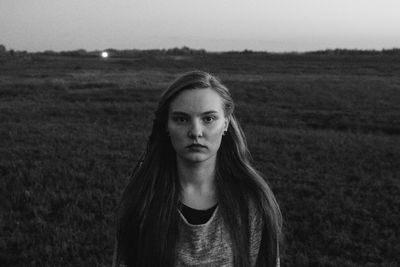 Portrait of woman on field