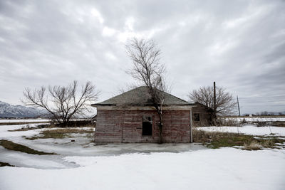 House against sky during winter