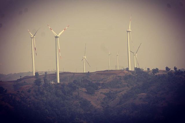 alternative energy, wind power, wind turbine, renewable energy, environmental conservation, windmill, fuel and power generation, landscape, technology, tranquility, tranquil scene, sky, clear sky, nature, traditional windmill, field, auto post production filter, rural scene, outdoors, low angle view