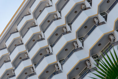 Identical semicircular balconies on the facade of a building in southern turkey. 