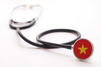 Close-up of stethoscope against white background
