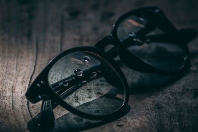 Close-up of sunglasses on table