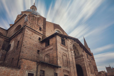 Low angle view of old building against sky