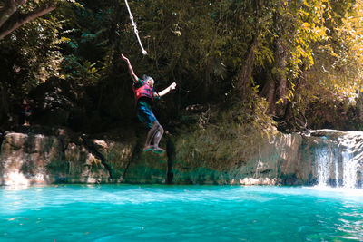 Man jumping in water