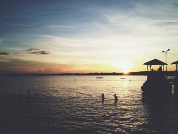 Scenic view of sea at sunset