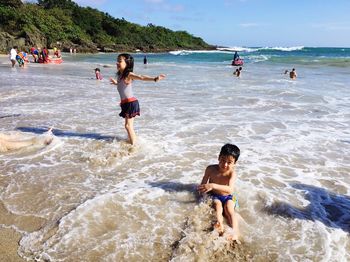 People enjoying at beach