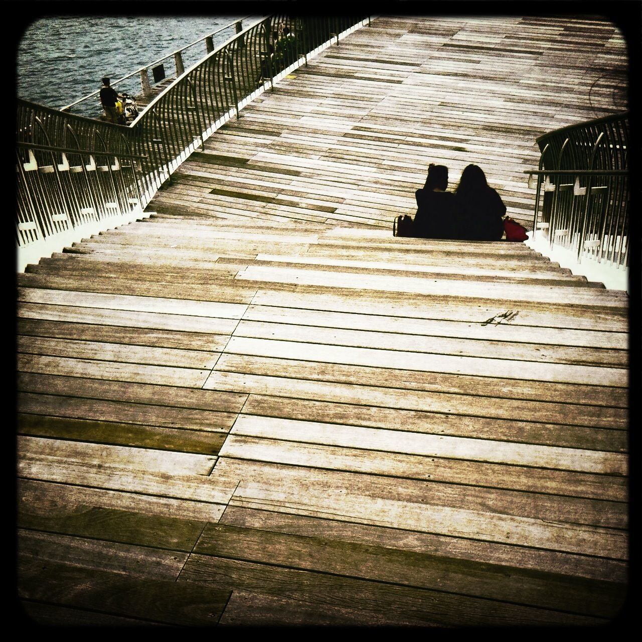 transfer print, auto post production filter, wood - material, railing, boardwalk, steps, built structure, the way forward, wood, wooden, shadow, steps and staircases, sunlight, staircase, architecture, pier, bench, outdoors, stairs, footbridge