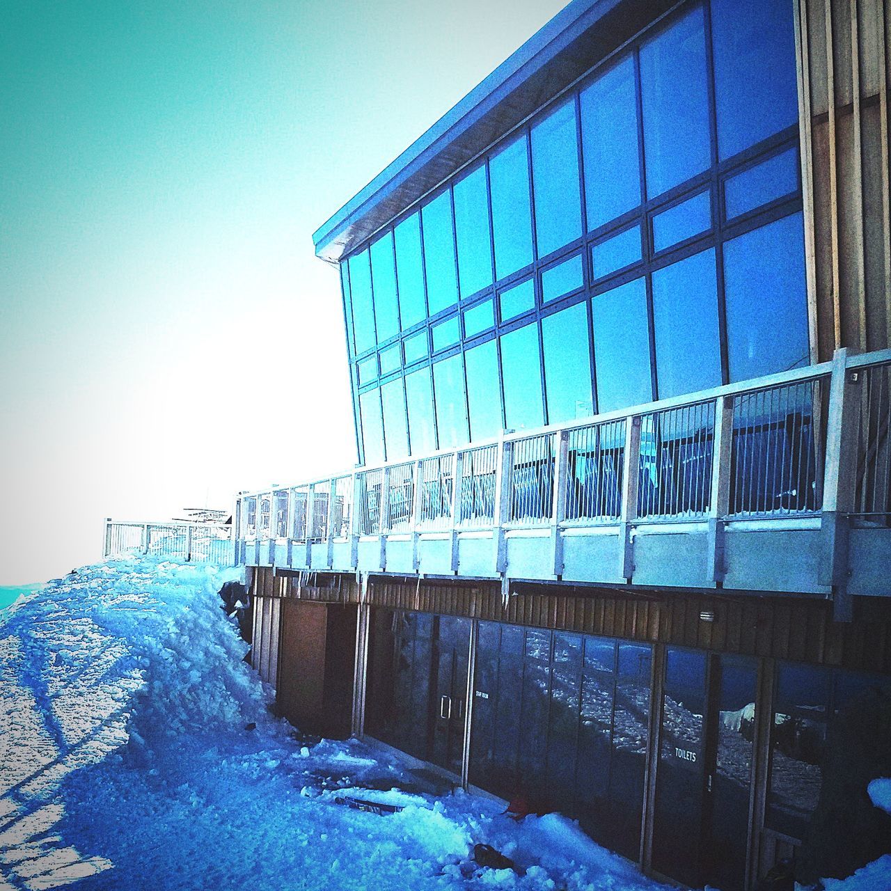 BUILDING IN WINTER AGAINST SKY